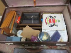 An antique leather suitcase together with another containing sundries, and a Masonic leather case