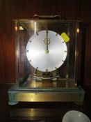 A 1950's Kundo battery powered pendulum coil clock