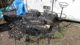A selection of wrought iron garden planters