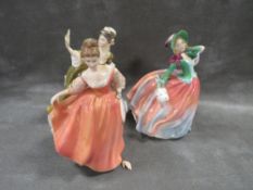 Three Royal Doulton figurines to include Autumn breezes and Fair Lady - this figure the hand is