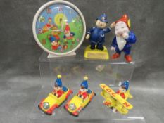 A collection of assorted Noddy toys etc to include a vintage alarm clock and a dwarf figure
