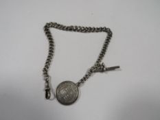 An antique hallmarked silver pocket watch albert chain