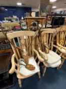 Two vintage sets of stags antlers on oak mounts together with a set of roe deer antlers