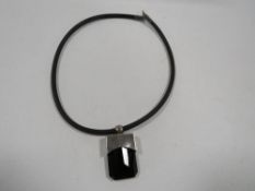 A silver mounted choker necklace