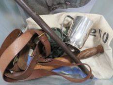 A box of military items, including a Sam Brown swagger stick, theodolite etc