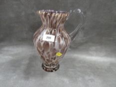 A Waterford Evolution mottled glass Urban Safari pitcher / jug