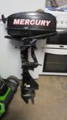 A Mercury 2 stroke outboard motor model 25
