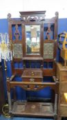 A mahogany hall stand together with an Eastern brass charger