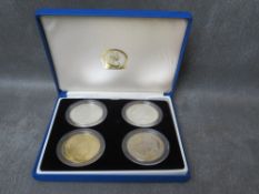 QEII silver 1oz Britannia 2014, silver year of the horse 2 pounds, together with 2 base metal crowns