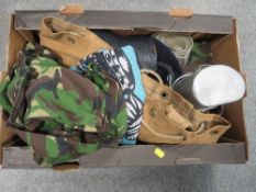 A tray of militaria to include jackets and gas mask etc