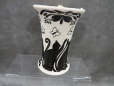 A Moorcroft 2014 black cat and butterflies vase