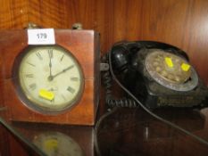 A vintage Seth Thomas clock together with a telephone