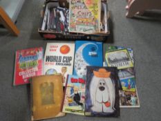 A tray containing vintage scrapbooks from the 1960s - 1970s / 1980s, a German cigarette card