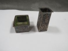 An antique Arts and Crafts white metal vase and glass lined dish, decorated with pomegranates