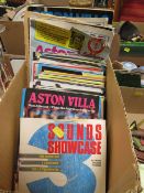 A tray of Aston Villa football programmes