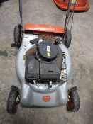 A petrol rotary mower missing grass box - House Clearance