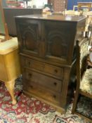 An oak priory style drinks cabinet