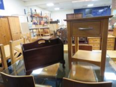 A small modern light oak bedside cabinet/lamp table together with a magazine rack