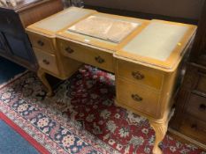 A vintage leather topped writing desk W 130 cm