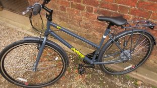 A grey Challenge VXT hybrid bike with steel frame, 18 speed, 28