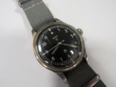 A vintage military wristwatch by Smiths, rear of case marked W10/6645-99-961-4045 2788/67