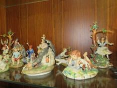A selection of assorted capodimonte style figures
