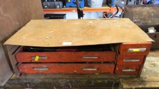 A mechanics steel tool cabinet with various tools