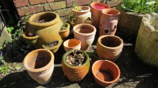 A selection of terracotta garden pots of various sizes