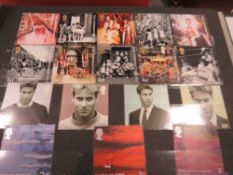 Four stamps albums containing British, Irish, Commonwealth and World stamps, many unfranked