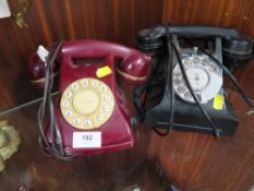 A vintage caller exchange telephone together with a modern example (2)