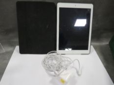 An Apple iPad with lead and plug - unchecked