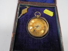 A cased hallmarked 18 carat gold open faced manual wind pocket watch by Thomas Milner of Wigan No.
