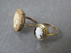 A hallmarked 9ct gold cameo dress ring, together with a white metal cameo ring stamped 9ct,