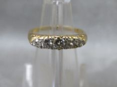 An 18ct gold five stone diamond ring, ring size P, approximate weight 3.97 g