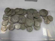A selection of pre 1947 silver coins to include half crowns, florins and sixpences etc