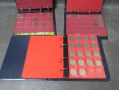 Three albums of British Regional and World coins to include issues from Isle of Man, Channel