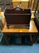 A mid-century teak nest of tables