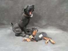 Two Breed Apart dog figures to include a Rottweiler