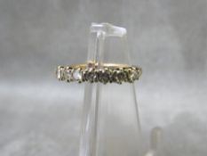 A hallmarked gold seven stone diamond ring, hallmarks indistinct, ring size L, approximate weight