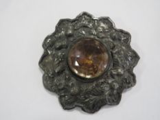 A large antique Scottish type white metal plaid brooch with thistle decoration and large central
