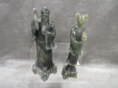A pair of Oriental jade style figures