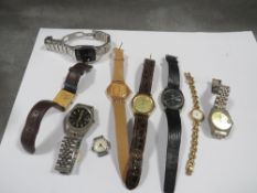 A selection of assorted replica and other wristwatches