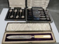 A cased set of hallmarked silver sealed topped coffee spoons approx combined weight 34g together