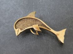 A hallmarked 9ct gold pendant in the form of a dolphin, approximate weight 4.27g