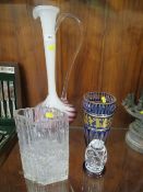 Four pieces of glassware to include a textured glass vase, blue/gold glass vase etc
