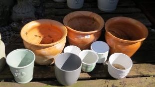 A selection of assorted glazed garden pots