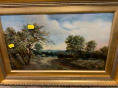 English School - A gilt framed and glazed oil on canvas depicting a country landscape with a