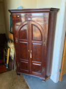 A 19th century mahogany inlaid floor standing corner cupboard