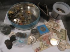 A collection of assorted coins and notes