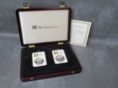 QEII date stamped 1oz silver Britannia coins x 2 31 December 2012 and 1 January 2013 presented in